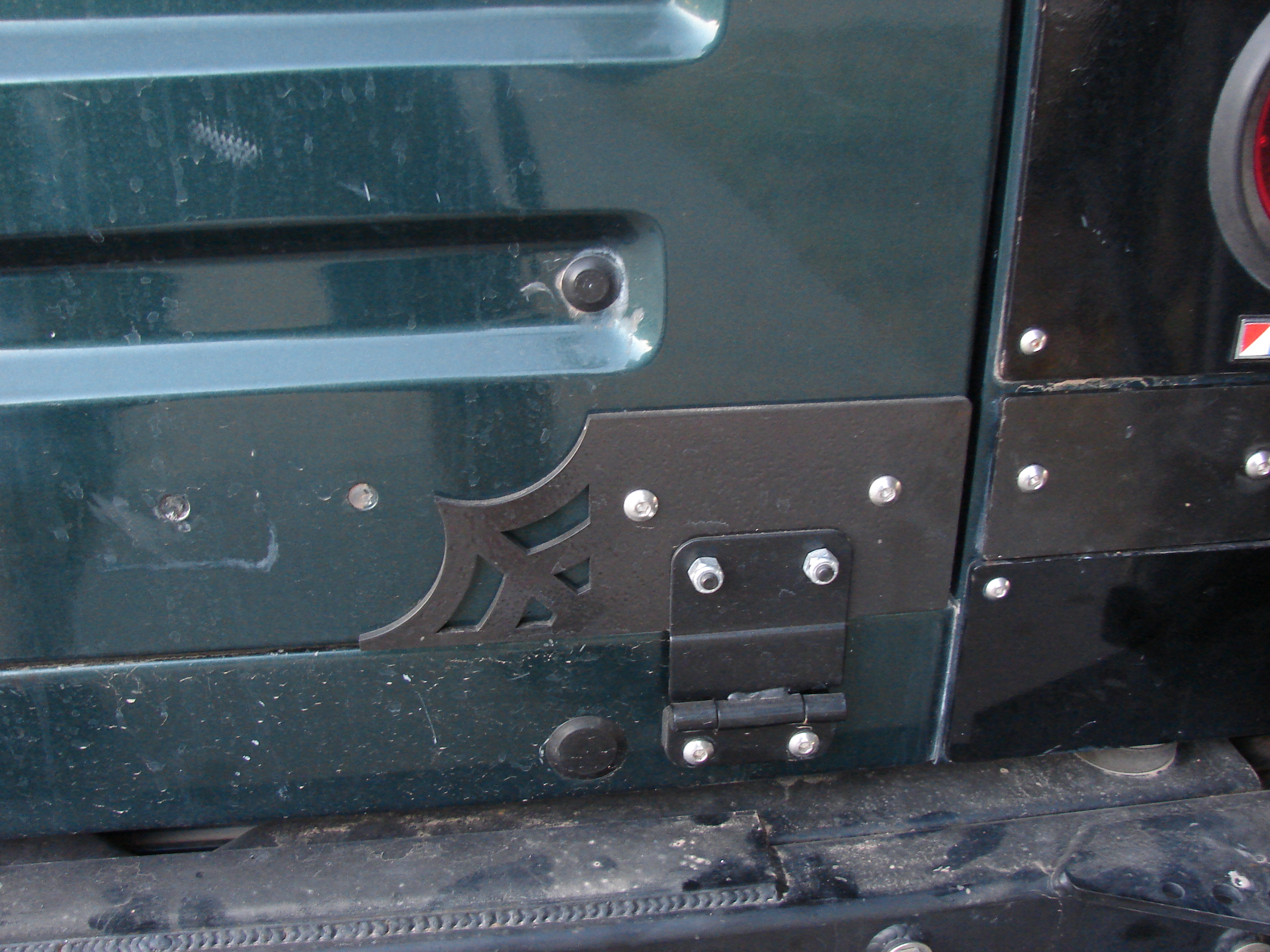 Cheap automotive plastic plugs cover the drilled access holes